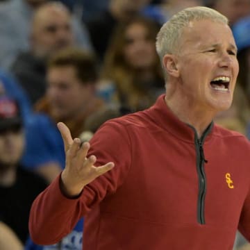 USC Trojans coach Andy Enfield yells from the bench in the second half against the UCLA Bruins at Pauley Pavilion presented by Wescom.