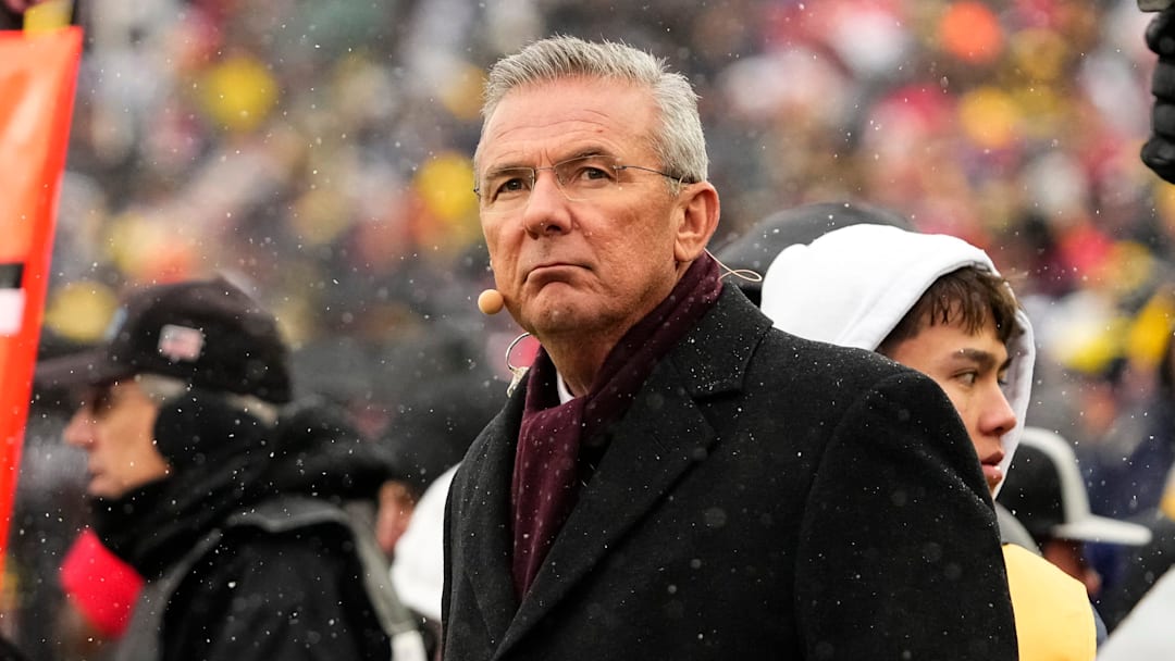 Former head coach Urban Meyer watches from the sideline during the NCAA football game between the Michigan Wolverines and the Ohio State Buckeyes at Michigan Stadium in Ann Arbor.