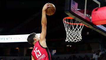 Jul 14, 2024; Las Vegas, NV, USA; Houston Rockets guard Reed Sheppard (15) dunks against the Washington Wizards during the third quarter at Thomas & Mack Center. Mandatory Credit: Stephen R. Sylvanie-USA TODAY Sports