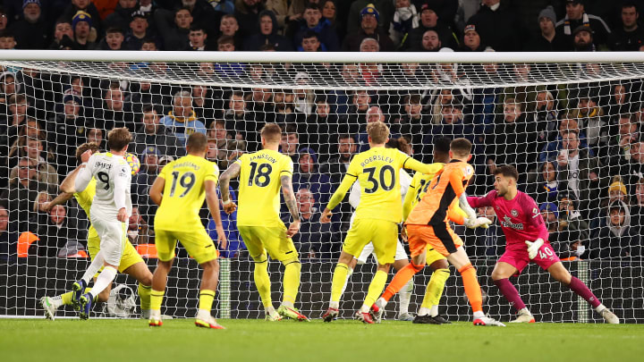 Patrick Bamford (left) scrambles in the equaliser as Leeds drew 2-2 with Brentford