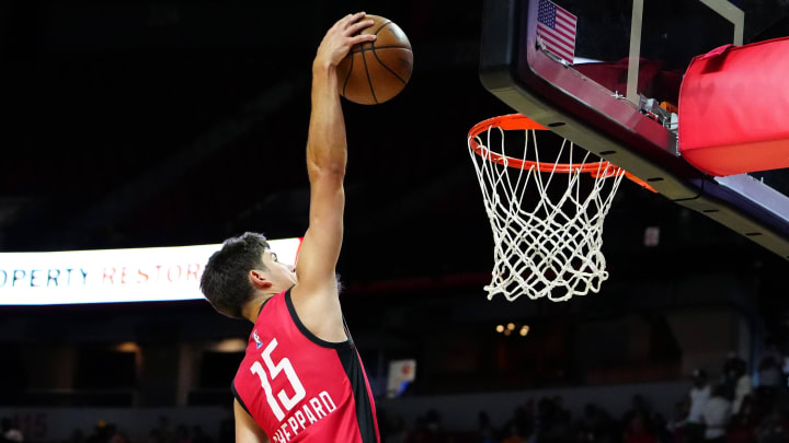 Jul 14, 2024; Las Vegas, NV, USA; Houston Rockets guard Reed Sheppard (15) dunks against the Washington Wizards