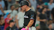 Aug 1, 2025; Miami, Florida, USA; Miami Marlins center fielder Jakob Marsee (87) celebrates after scoring against the New York Yankees during the seventh inning  at loanDepot Park. Mandatory Credit: Sam Navarro-Imagn Images