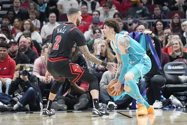 Chicago Bulls guard Lonzo Ball (2) defends Charlotte Hornets guard LaMelo Ball (1) 