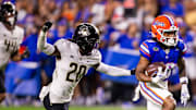 Florida Gators wide receiver Tank Hawkins (10) outruns UCF Knights defensive back Mac McWilliams (20) during the first half at Ben Hill Griffin Stadium in Gainesville, FL on Saturday, October 5, 2024. [Doug Engle/Gainesville Sun]