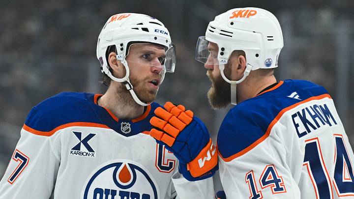 Feb 26, 2026; Los Angeles, California, USA; Edmonton Oilers center Connor McDavid (97) talks to Edmonton Oilers center Adam Henrique (19) during the first period between the Edmonton Oilers and the Los Angeles Kings at Crypto.com Arena. Mandatory Credit: Griffin Hooper-Imagn Images