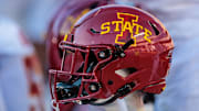 Nov 9, 2024; Kansas City, Missouri, USA; Iowa State Cyclones helmets on the bench during the first quarter against the Kansas Jayhawks at GEHA Field at Arrowhead Stadium. Mandatory Credit: William Purnell-Imagn Images