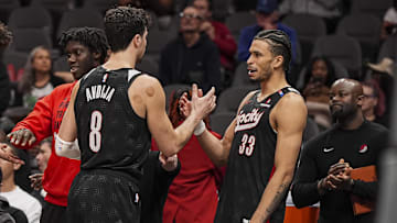 Apr 1, 2025; Atlanta, Georgia, USA: Portland Trail Blazers forwards Deni Avdija (8) and  Toumani Camara (33) react late in the game against the Atlanta Hawks during the second half at State Farm Arena. Mandatory Credit: Dale Zanine-Imagn Images