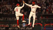 Anaheim, California, USA;  Los Angeles Angels shortstop Zach Neto (9) and right fielder Jo Adell (7) celebrate a win after defeating the Los Angeles Dodgers 6-5 at Angel Stadium.