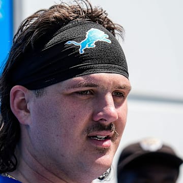 Detroit Lions offensive lineman Tate Ratledge (69).