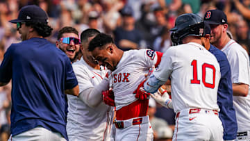 Jun 4, 2025; Boston, Massachusetts, USA; Boston Red Sox outfielder Ceddanne Rafaela (3) is congratulated after hitting a game winning home run against the Los Angeles Angels in the ninth inning at Fenway Park. 