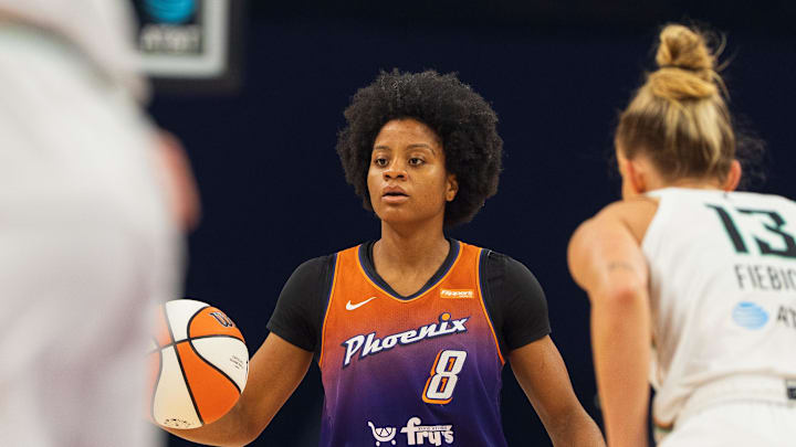 Aug 30, 2025; Phoenix, Arizona, USA; Phoenix Mercury guard Monique Akoa Makani (8) brings the ball down court in the first quarter against the New York Liberty at Footprint Center. Mandatory Credit: Allan Henry-Imagn Images
