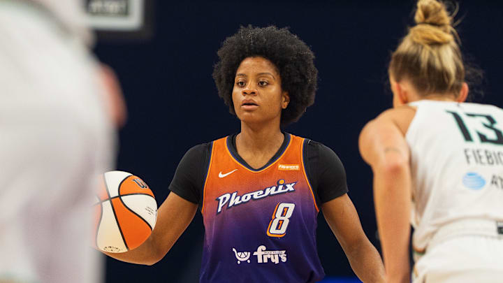 Aug 30, 2025; Phoenix, Arizona, USA; Phoenix Mercury guard Monique Akoa Makani (8) brings the ball down court in the first quarter against the New York Liberty at Footprint Center. Mandatory Credit: Allan Henry-Imagn Images