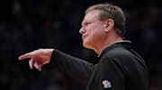Feb 27, 2024; Lawrence, Kansas, USA; Kansas Jayhawks head coach Bill Self gestures to players against the Brigham Young Cougars during the first half at Allen Fieldhouse. Mandatory Credit: Denny Medley-Imagn Images