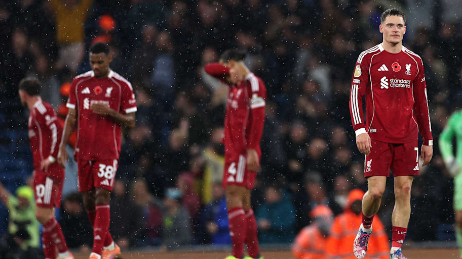Florian Wirtz, Ryan Gravenberch and Virgil van Dijk look dejected.
