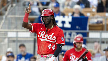 Mar 4, 2025; Phoenix, Arizona, USA; Cincinnati Reds shortstop Elly De La Cruz reacts after scoring against the Los Angeles Dodgers during a spring training game at Camelback Ranch-Glendale. Mandatory Credit: Mark J. Rebilas-Imagn Images