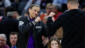 Apr 2, 2024; Sacramento, California, USA; Sacramento Kings owner Vivek Ranadive poses for a photo with professional mixed martial artist Nate Diaz smiles from his seat during the third quarter between the LA Clippers against Sacramento Kings at Golden 1 Center. Mandatory Credit: Sergio Estrada-Imagn Images