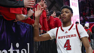 Mar 9, 2025; Piscataway, New Jersey, USA; Rutgers Scarlet Knights guard Ace Bailey (4) slap hands with fans after the game against the Minnesota Golden Gophers at Jersey Mike's Arena. Mandatory Credit: Vincent Carchietta-Imagn Images
