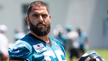 Jacksonville Jaguars guard Patrick Mekari (65) takes a breather during the fourth organized team activity at the Miller Electric Center in Jacksonville, Fla. Tuesday, May 27, 2025. [Doug Engle/Florida Times-Union]