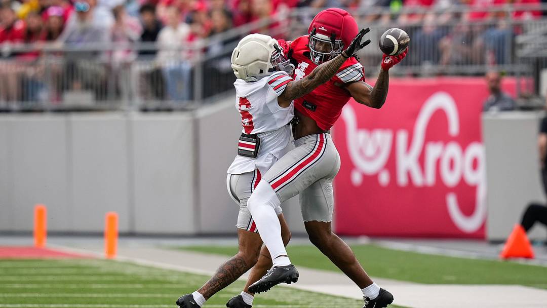 Wide receiver Jeremiah Smith (4) attempts to catch the ball against Cornerback Devin Sanchez (6) in the first half of the Ohio State football spring game at Ohio Stadium on Saturday, April 18, 2026 in Columbus, Ohio. Wide receiver Jeremiah Smith (4) attempts to catch the ball against Cornerback Devin Sanchez (6) in the first half of the Ohio State football spring game at Ohio Stadium on Saturday, April 18, 2026 in Columbus, Ohio.