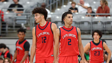 Jun 25, 2023; Glendale, AZ, USA; Columbus player Cameron Boozer (12) and brother Cayden Boozer (2) during the Section 7 high school boys tournament at State Farm Stadium. Mandatory Credit: Mark J. Rebilas-Imagn Images