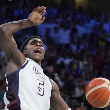 Jul 31, 2024; Villeneuve-d'Ascq, France; United States guard Anthony Edwards (5) reacts after a basket in the fourth quarter against South Sudan during the Paris 2024 Olympic Summer Games at Stade Pierre-Mauroy. Mandatory Credit: John David Mercer-USA TODAY Sports
