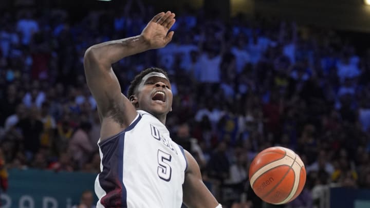 Jul 31, 2024; Villeneuve-d'Ascq, France; United States guard Anthony Edwards (5) reacts after a basket in the fourth quarter against South Sudan during the Paris 2024 Olympic Summer Games at Stade Pierre-Mauroy. Mandatory Credit: John David Mercer-USA TODAY Sports