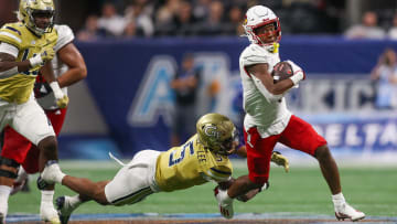 Sep 1, 2023; Atlanta, Georgia, USA; Louisville Cardinals wide receiver Jamari Thrash (1) runs after a catch against the Georgia Tech Yellow Jackets in the fourth quarter at Mercedes-Benz Stadium. 