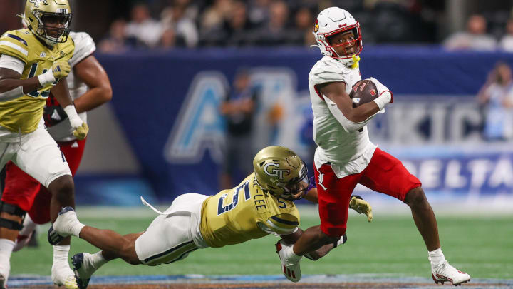 Sep 1, 2023; Atlanta, Georgia, USA; Louisville Cardinals wide receiver Jamari Thrash (1) runs after a catch against the Georgia Tech Yellow Jackets in the fourth quarter at Mercedes-Benz Stadium. 