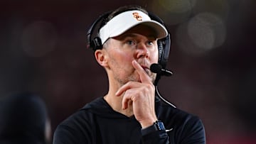 Nov 7, 2025; Los Angeles, California, USA; Southern California Trojans head coach Lincoln Riley watches game action against the Northwestern Wildcats during the second half at the Los Angeles Memorial Coliseum. Mandatory Credit: Gary A. Vasquez-Imagn Images