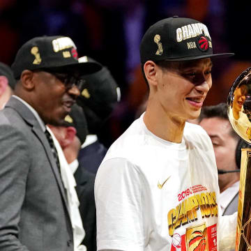 Jun 13, 2019; Oakland, CA, USA; Toronto Raptors guard Jeremy Lin (17) celebrates with the Larry O'Brian Trophy after beating the Golden State Warriors in game six of the 2019 NBA Finals at Oracle Arena. Mandatory Credit: Kyle Terada-USA TODAY Sports