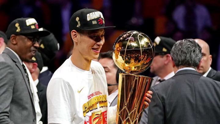 Jun 13, 2019; Oakland, CA, USA; Toronto Raptors guard Jeremy Lin (17) celebrates with the Larry O'Brian Trophy after beating the Golden State Warriors in game six of the 2019 NBA Finals at Oracle Arena. Mandatory Credit: Kyle Terada-USA TODAY Sports