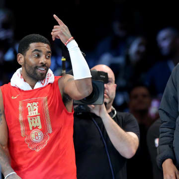 Jan 26, 2023; Brooklyn, New York, USA; Brooklyn Nets guard Kyrie Irving (11) and forward Kevin Durant (7) react after being announced as 2013 all stars during the second quarter against the Detroit Pistons at Barclays Center. Mandatory Credit: Brad Penner-USA TODAY Sports