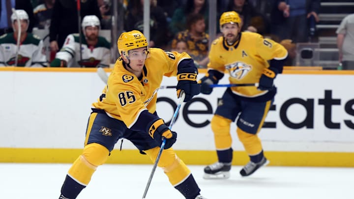 Apr 11, 2026; Nashville, Tennessee, USA; Nashville Predators defenseman Ryan Ufko (85) passes the puck during the first period of their game against the Minnesota Wild at Bridgestone Arena. Mandatory Credit: Alan Poizner-Imagn Images