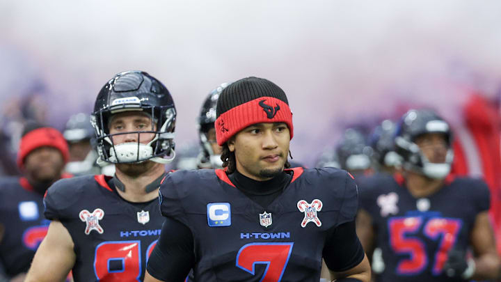 Dec 25, 2024; Houston, Texas, USA; Houston Texans quarterback C.J. Stroud (7) enters the field before playing against the Baltimore Ravens at NRG Stadium. Mandatory Credit: Thomas Shea-Imagn Images