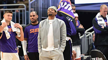 Phoenix Suns forward Kevin Durant looks on in the fourth quarter while sidelined with an injury against the Milwaukee Bucks