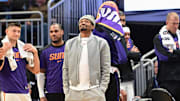 Phoenix Suns forward Kevin Durant looks on in the fourth quarter while sidelined with an injury against the Milwaukee Bucks