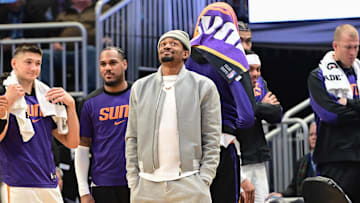 Phoenix Suns forward Kevin Durant looks on in the fourth quarter while sidelined with an injury against the Milwaukee Bucks