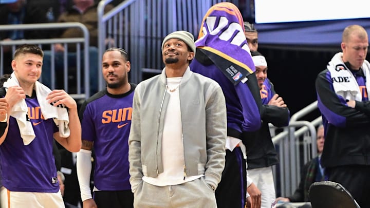 Phoenix Suns forward Kevin Durant looks on in the fourth quarter while sidelined with an injury against the Milwaukee Bucks