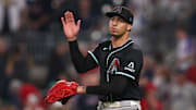 Jun 4, 2025; Atlanta, Georgia, USA; Arizona Diamondbacks relief pitcher Justin Martinez (63) celebrates after a victory over the Atlanta Braves at Truist Park. Mandatory Credit: Brett Davis-Imagn Images