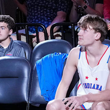 Indiana All-Star and Mr. Basketball Braylon Mullins sits on the sidelines during team introductions Saturday, June 7, 2025, during the Indiana vs. Kentucky All-Star game at Gainbridge Fieldhouse in Indianapolis.