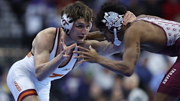 Mar 21, 2025; Philadelphia, PA, USA; Caleb Henson of Virginia Tech wrestles Jordan Williams of Little Rock during day two of the NCAA Wrestling Championships at Wells Fargo Center. Mandatory Credit: Bill Streicher-Imagn Images