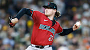 Sep 26, 2025; San Diego, California, USA; Arizona Diamondbacks relief pitcher Andrew Saalfrank (27) throws a pitch during the seventh inning against the San Diego Padres at Petco Park. Mandatory Credit: David Frerker-Imagn Images