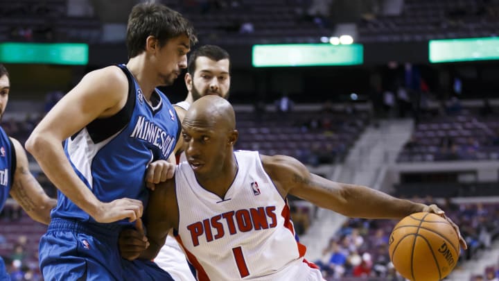 Dec 10, 2013; Auburn Hills, MI, USA; Detroit Pistons shooting guard Chauncey Billups (1) moves the ball on Minnesota Timberwolves point guard Alexey Shved (1) in the fourth quarter at The Palace of Auburn Hills. Minnesota won 121-94. Mandatory Credit: Rick Osentoski-USA TODAY Sports