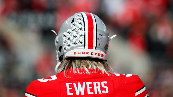 Sat., Nov. 20, 2021; Columbus, Ohio, USA; Ohio State Buckeyes quarterback Quinn Ewers (3) practices on the sideline during a break in play in the second quarter of a NCAA Division I football game between the Ohio State Buckeyes and the Michigan State Spartans at Ohio Stadium. Mandatory Credit: Joshua A. Bickel/Columbus Dispatch via USA TODAY Network.

Cfb Michigan State Spartans At Ohio State Buckeyes