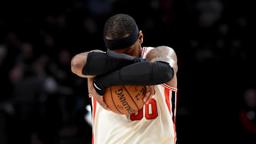 Dec 18, 2019; Portland, OR, USA: Portland Trail Blazers forward Carmelo Anthony (00) hugs the ball before a game against the Golden State Warriors at Moda Center. Mandatory Credit: Steve Dykes-Imagn Images