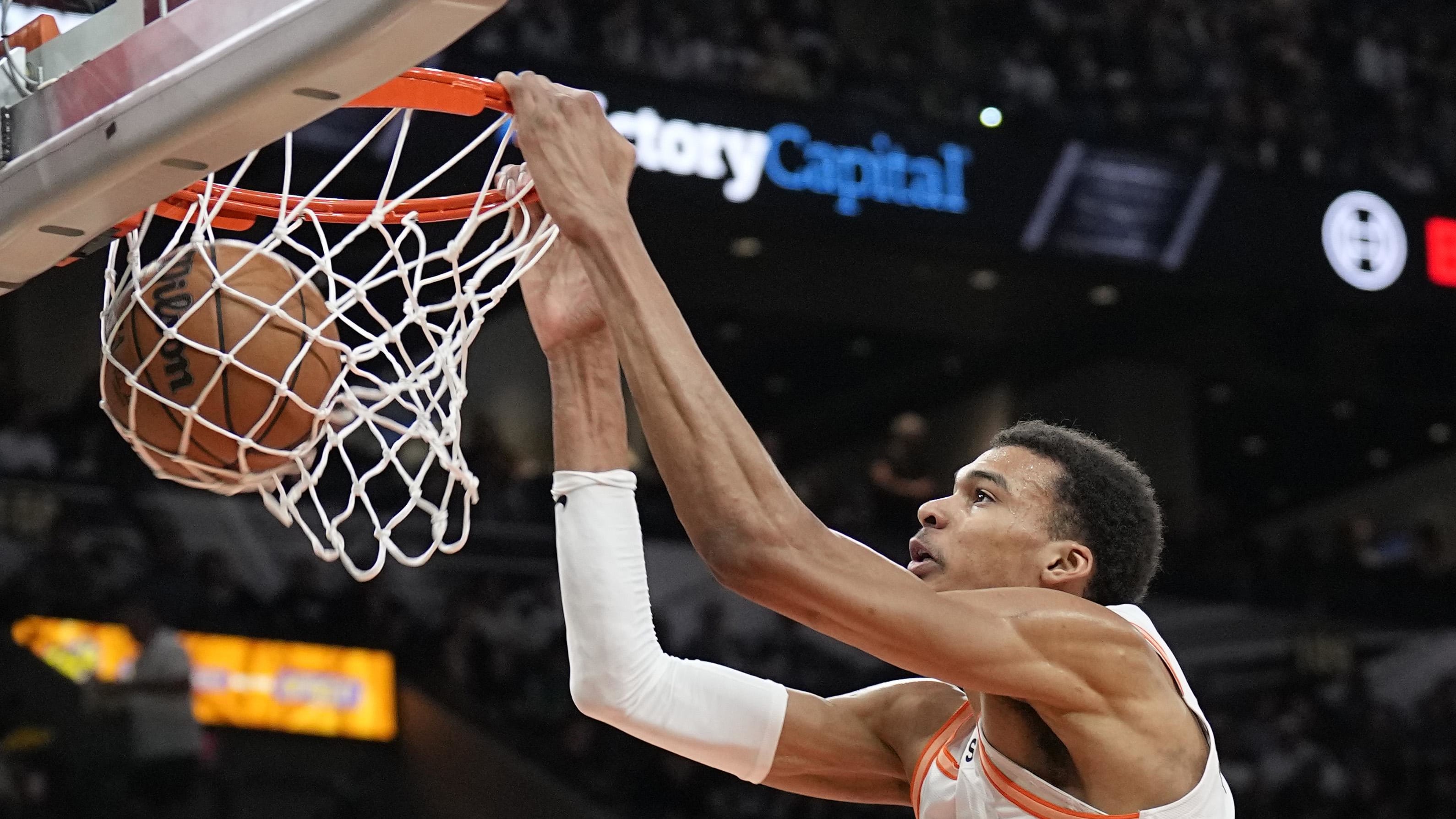 Feb 3, 2024; San Antonio, Texas, USA; San Antonio Spurs forward Victor Wembanyama (1) dunks during