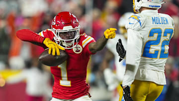 Dec 8, 2024; Kansas City, Missouri, USA; Kansas City Chiefs Wide Receiver Xavier Worthy (1) celebrates a first down during the second half against the Los Angeles Chargers at GEHA Field at Arrowhead Stadium. Mandatory Credit: Jay Biggerstaff-Imagn Images