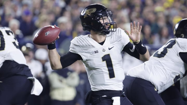 Purdue Boilermakers quarterback Hudson Card throws a pass.