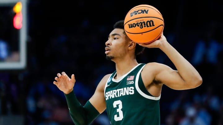 Michigan State guard Jaden Akins (3) looks to pass against North Carolina during the second half of the NCAA tournament West Region second round at Spectrum Center in Charlotte, N.C. on Saturday, March 23, 2024.