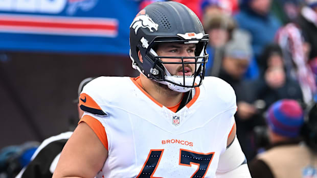 Denver Broncos offensive tackle Alex Palczewski (63) enters the field before an AFC wild card game against the Buffalo Bills.